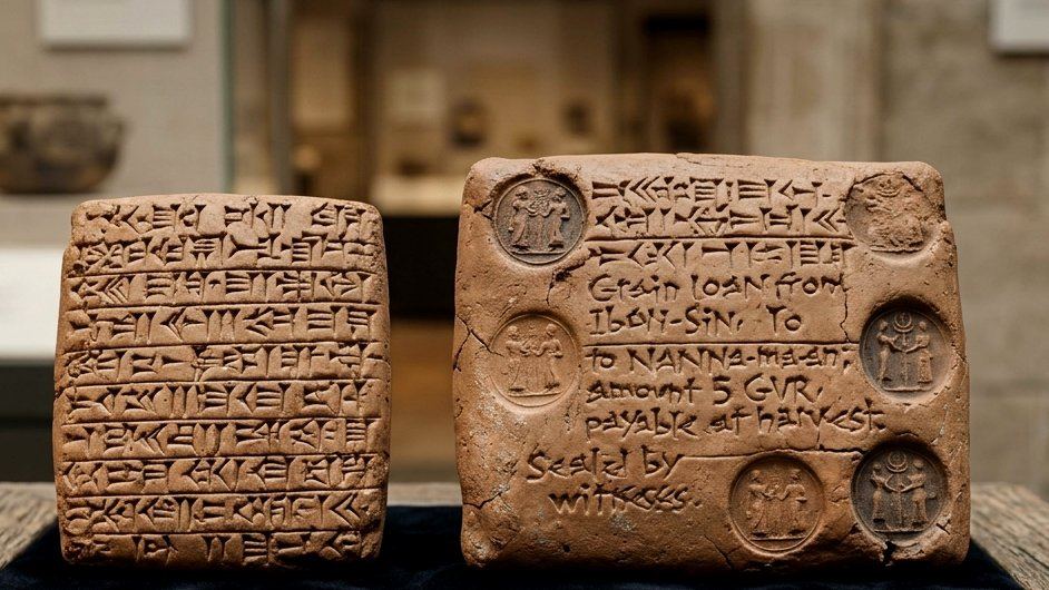 Two Mesopotamian cuneiform tablets, a loan and its sealed clay envelope